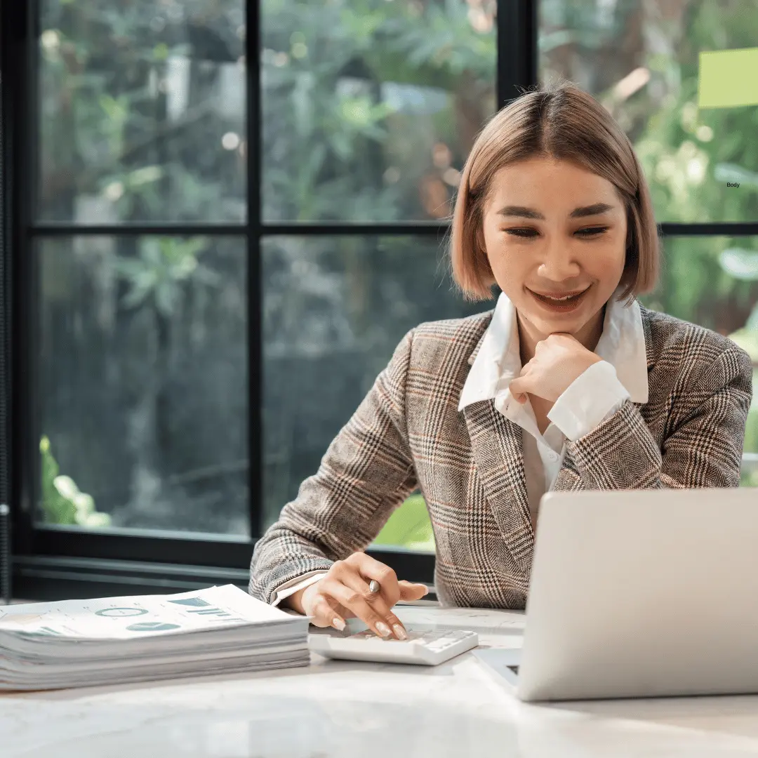 Calculator, financial charts and organised accounting files